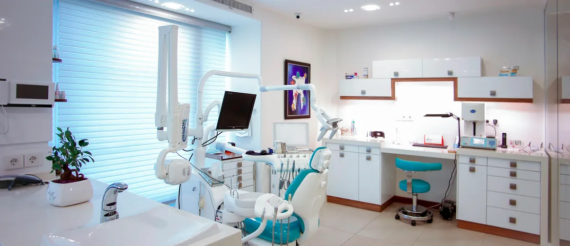 Illustrative photo: a dental practice with treatment chairs